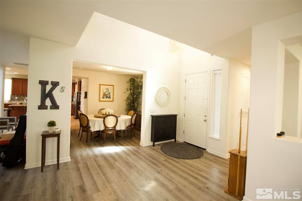 505 Terracina Way Reno, NV 89521 - Photo 11 of 26 a living room with furniture and a wooden floor