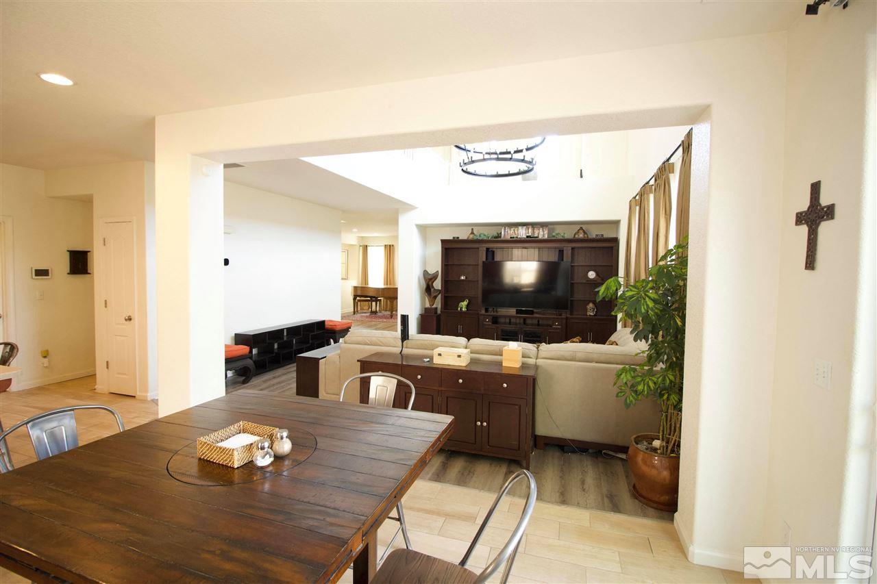 505 Terracina Way Reno, NV 89521 - Photo 13 of 26 a living room with furniture and a flat screen tv