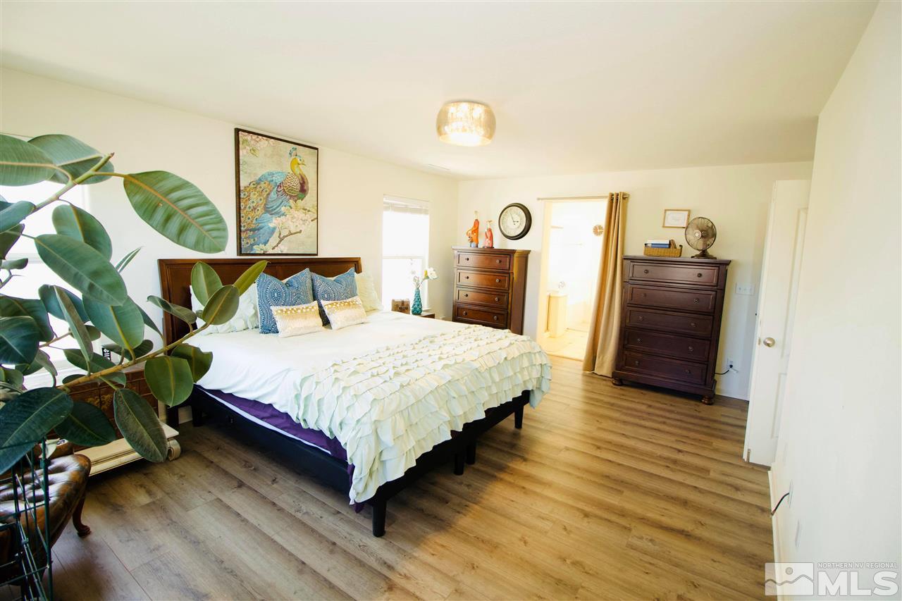 505 Terracina Way Reno, NV 89521 - Photo 15 of 26 a bedroom with a bed and a view of bedroom