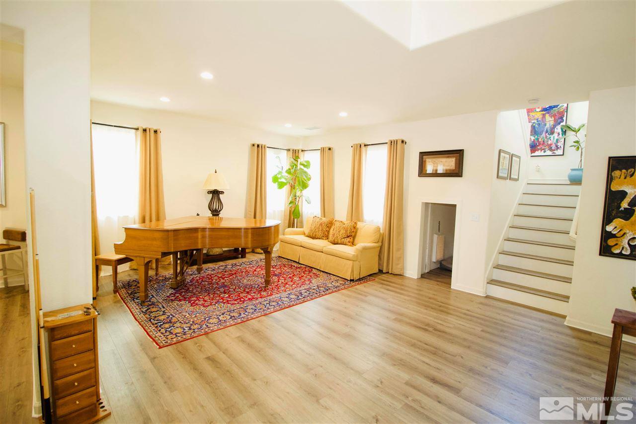 505 Terracina Way Reno, NV 89521 - Photo 7 of 26 a living room with furniture and a table