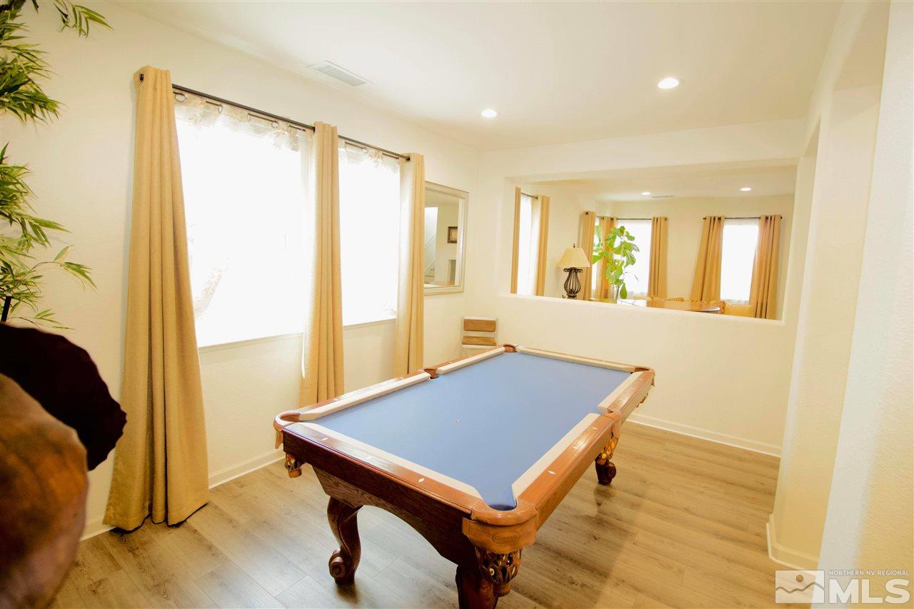 505 Terracina Way Reno, NV 89521 - Photo 9 of 26 a view of a room with furniture and wooden floor