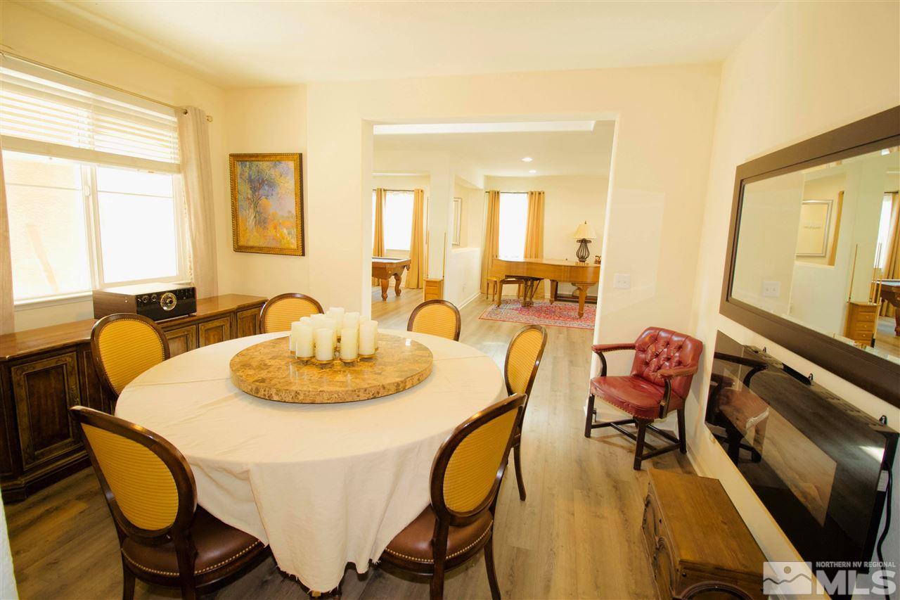 505 Terracina Way Reno, NV 89521 - Photo 10 of 26 a dining room with furniture and wooden floor