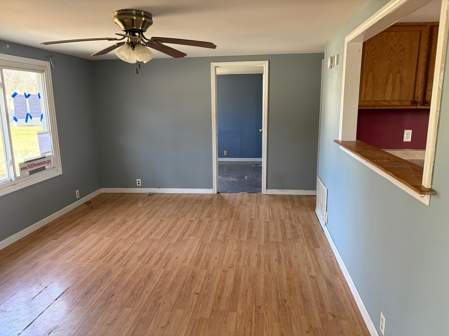 3543 William Street Steger, IL 60475 - Photo 4 of 21 a view of empty room with wooden floor and fan