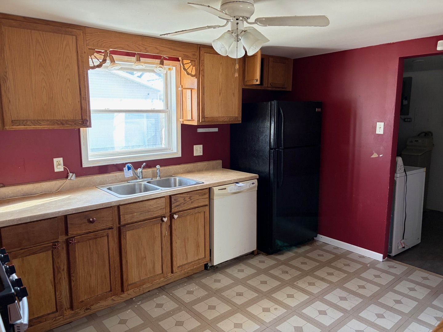 3543 William Street Steger, IL 60475 - Photo 6 of 21 a kitchen with a sink cabinets and appliances