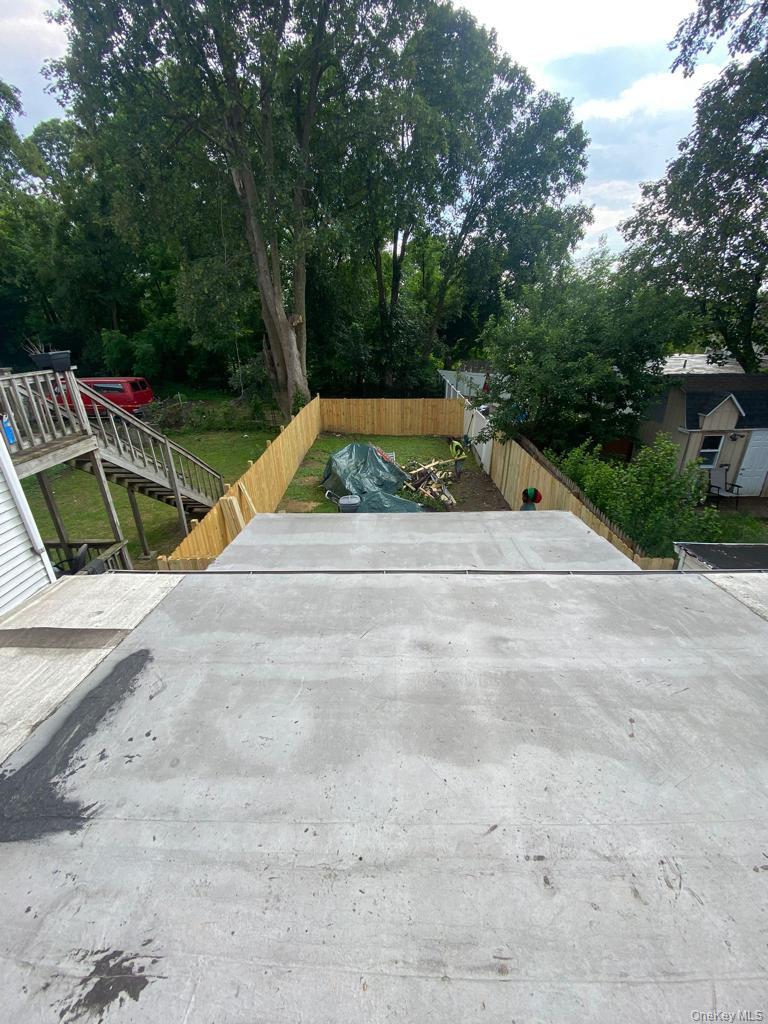 39 Ann Street Ossining, NY 10562 - Photo 26 of 27 a view of a backyard with swimming pool
