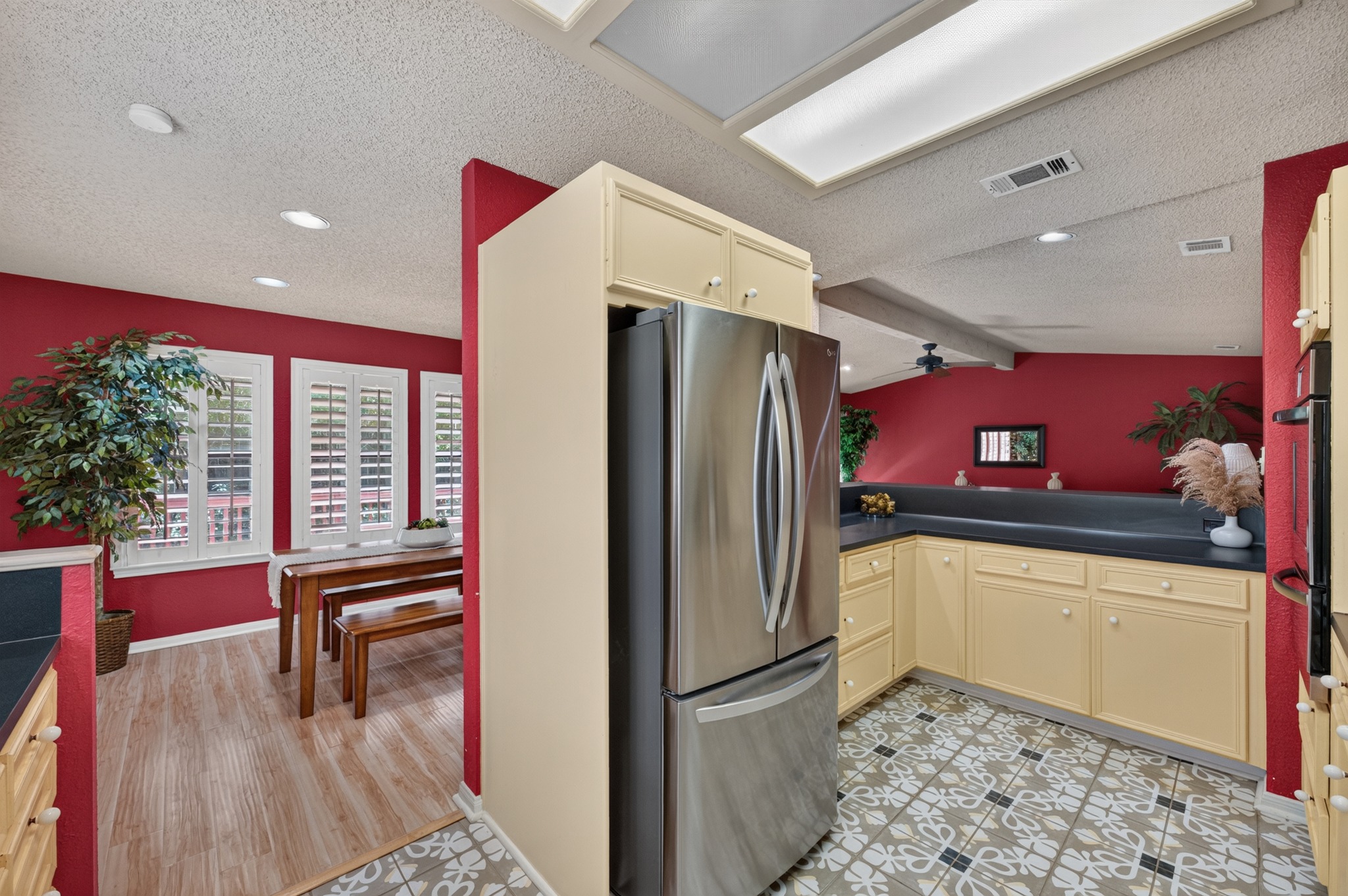 1907 Stoneridge Road Austin, TX 78746 - Photo 13 of 36 Spacious kitchen layout with additional cabinetry and nearby dining space.