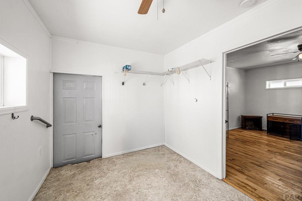 8435 Savage Road Beulah, CO 81023 - Photo 19 of 34 a view of a livingroom with wooden floor