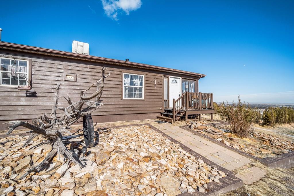 8435 Savage Road Beulah, CO 81023 - Photo 24 of 34 a house view with a backyard space