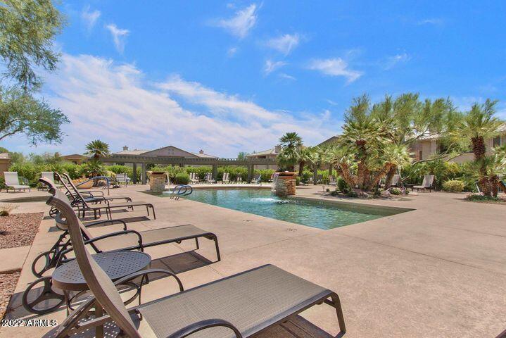 16013 South Desert Foothills Parkway, Unit 1033 Phoenix, AZ 85048 - Photo 2 of 42 a view of a house with a yard