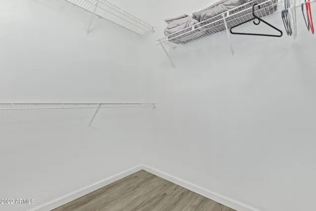 a view of a room with racks on the wall