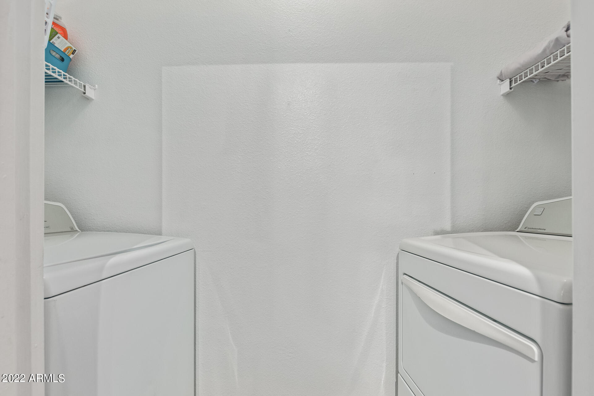 16013 South Desert Foothills Parkway, Unit 1033 Phoenix, AZ 85048 - Photo 25 of 42 a utility room with dryer and washer