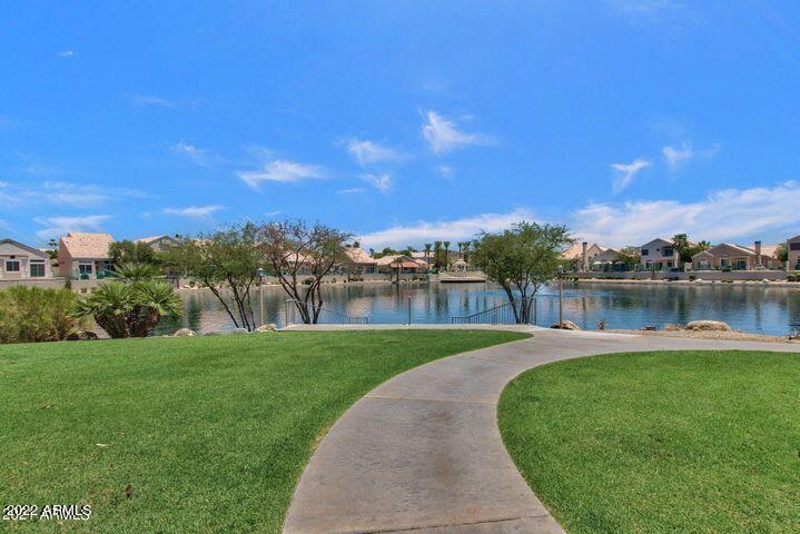 16013 South Desert Foothills Parkway, Unit 1033 Phoenix, AZ 85048 - Photo 36 of 42 a view of a lake with a big yard