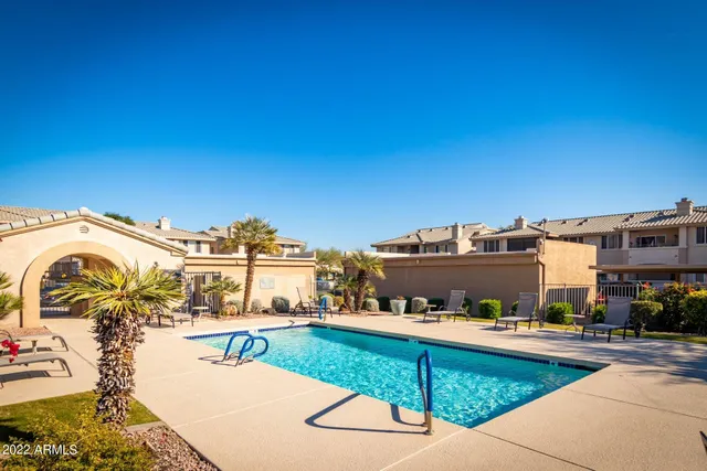 a view of a building with a swimming pool