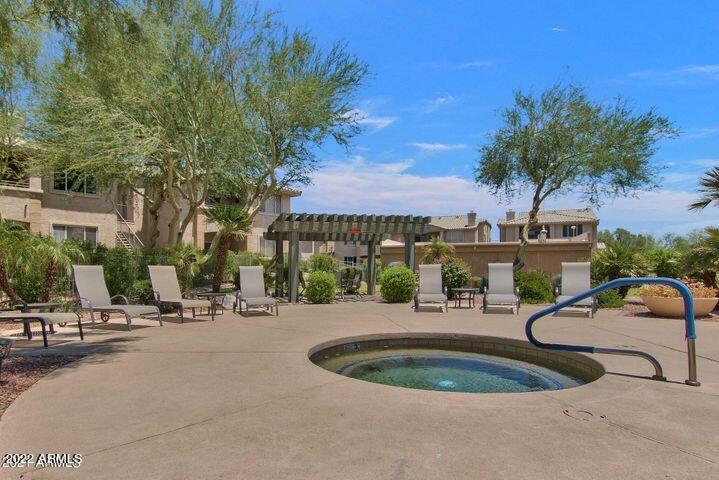 16013 South Desert Foothills Parkway, Unit 1033 Phoenix, AZ 85048 - Photo 42 of 42 a view of a backyard with a patio