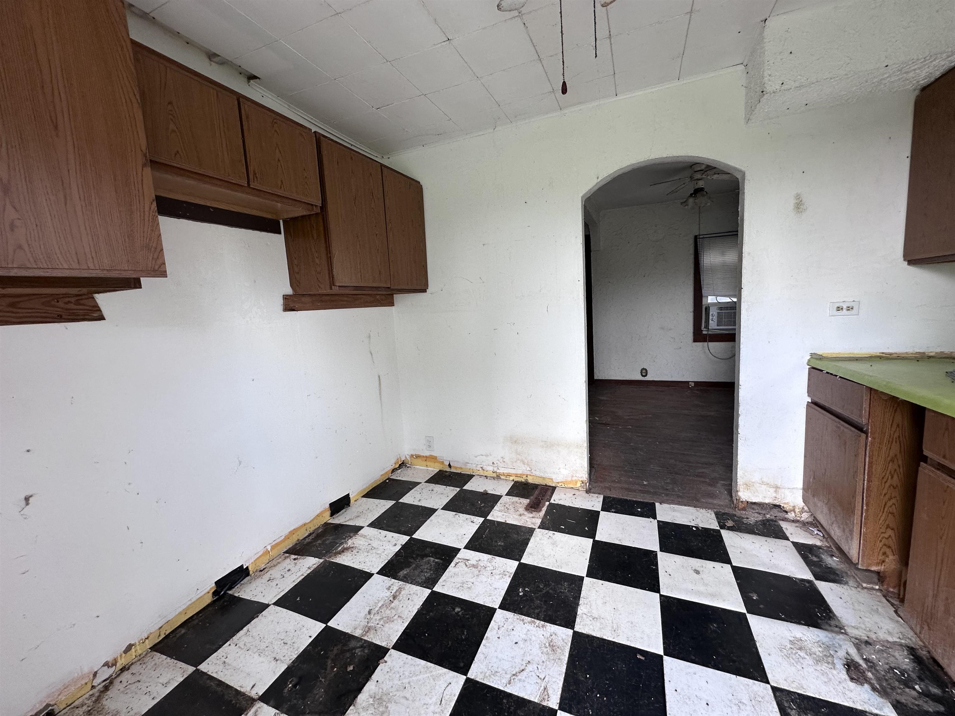 2855 West Florence Road Freeport, IL 61032 - Photo 7 of 13 a black and white checkered floor with a black white checkered floor
