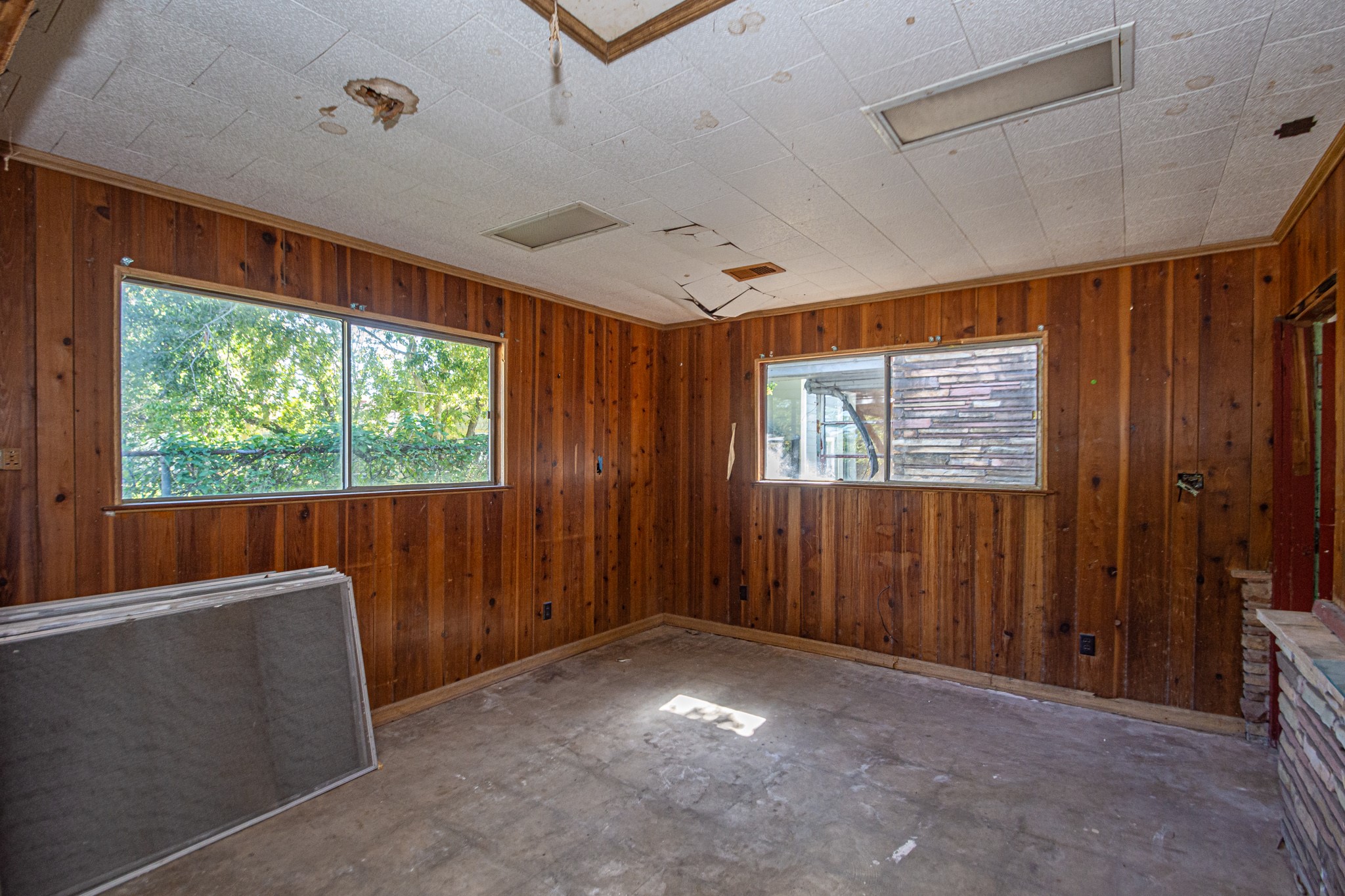1230 West 4th Street Freeport, TX 77541 - Photo 38 of 49 Beautiful wood walls. This area will need to be finished.