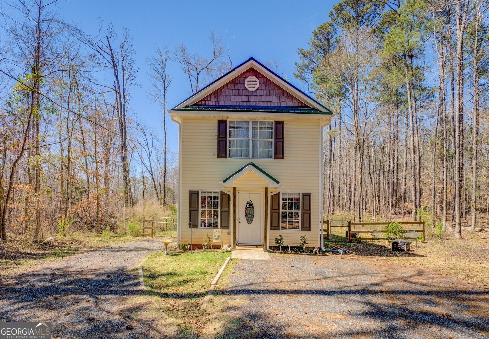 140 Southern Shores Road Jackson, GA 30233 - Photo 1 of 1 a front view of a house with a yard