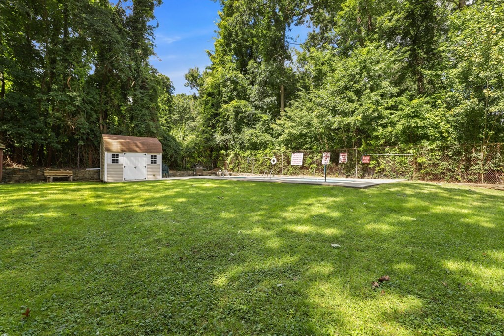 47 West Street, Unit C4 Randolph, MA 02368 - Photo 18 of 19 a view of a field with grass and trees