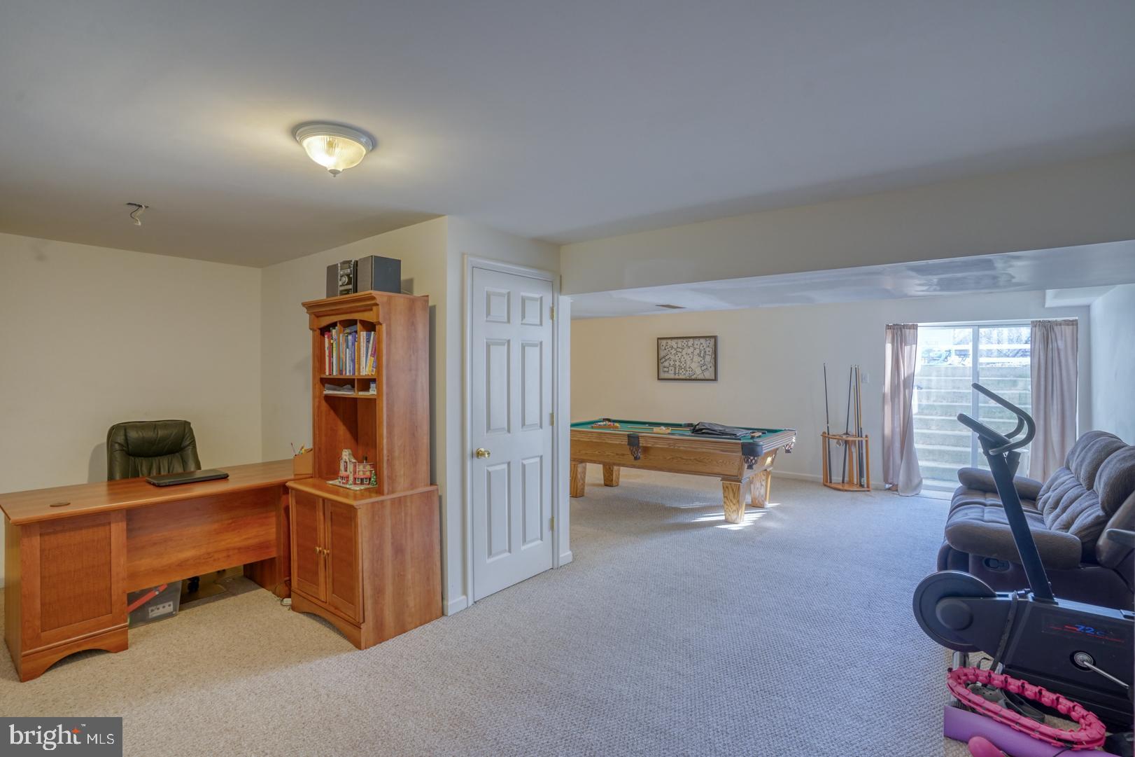 226 York Drive Smyrna, DE 19977 - Photo 31 of 60 a view of a livingroom with workspace and a couch