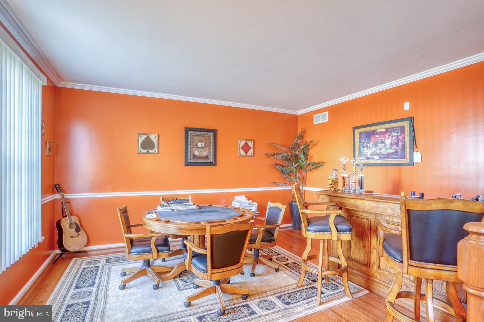 226 York Drive Smyrna, DE 19977 - Photo 5 of 60 a workspace with furniture and wooden floor