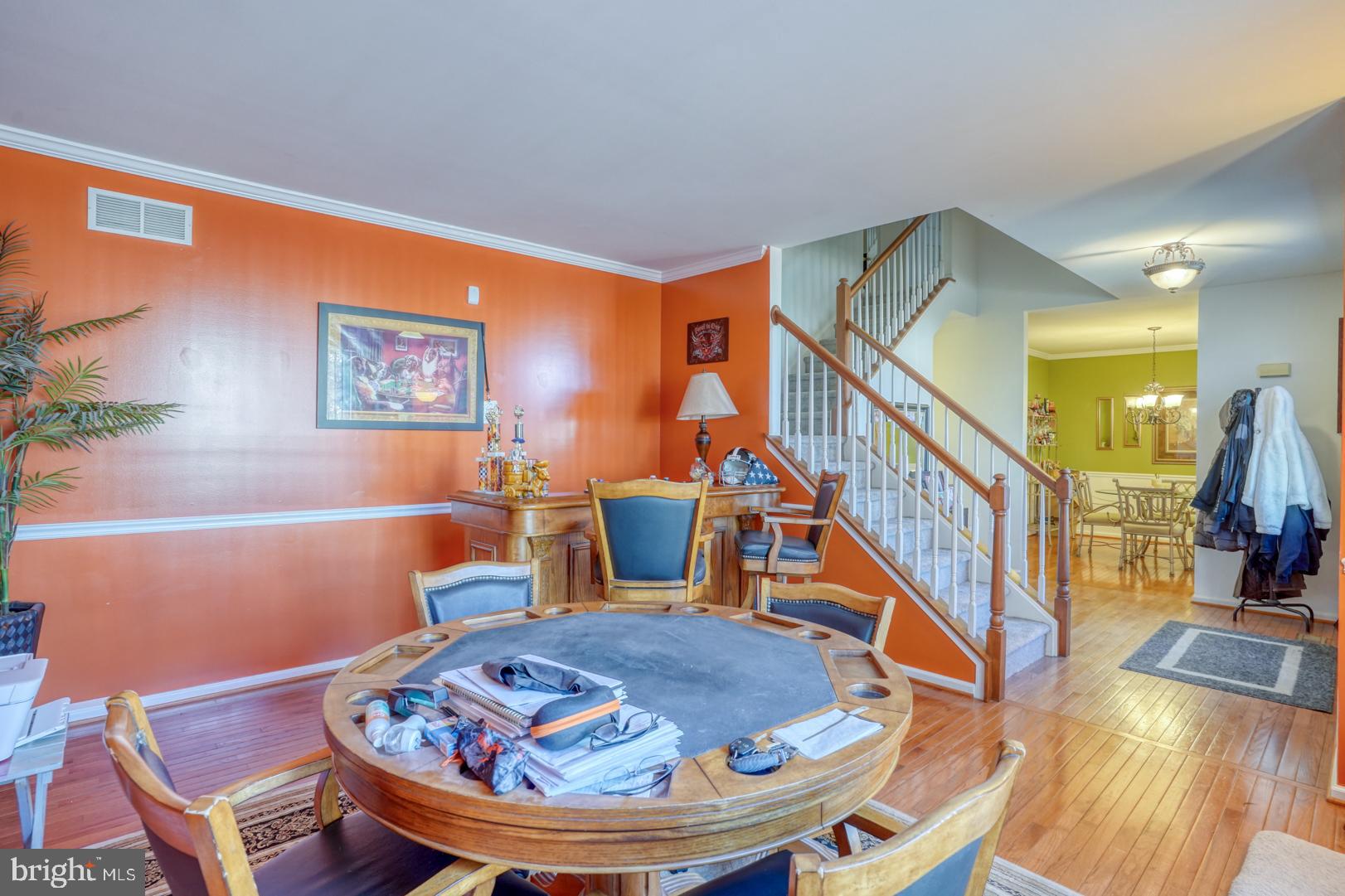 226 York Drive Smyrna, DE 19977 - Photo 6 of 60 a dining room with furniture a rug and wooden floor