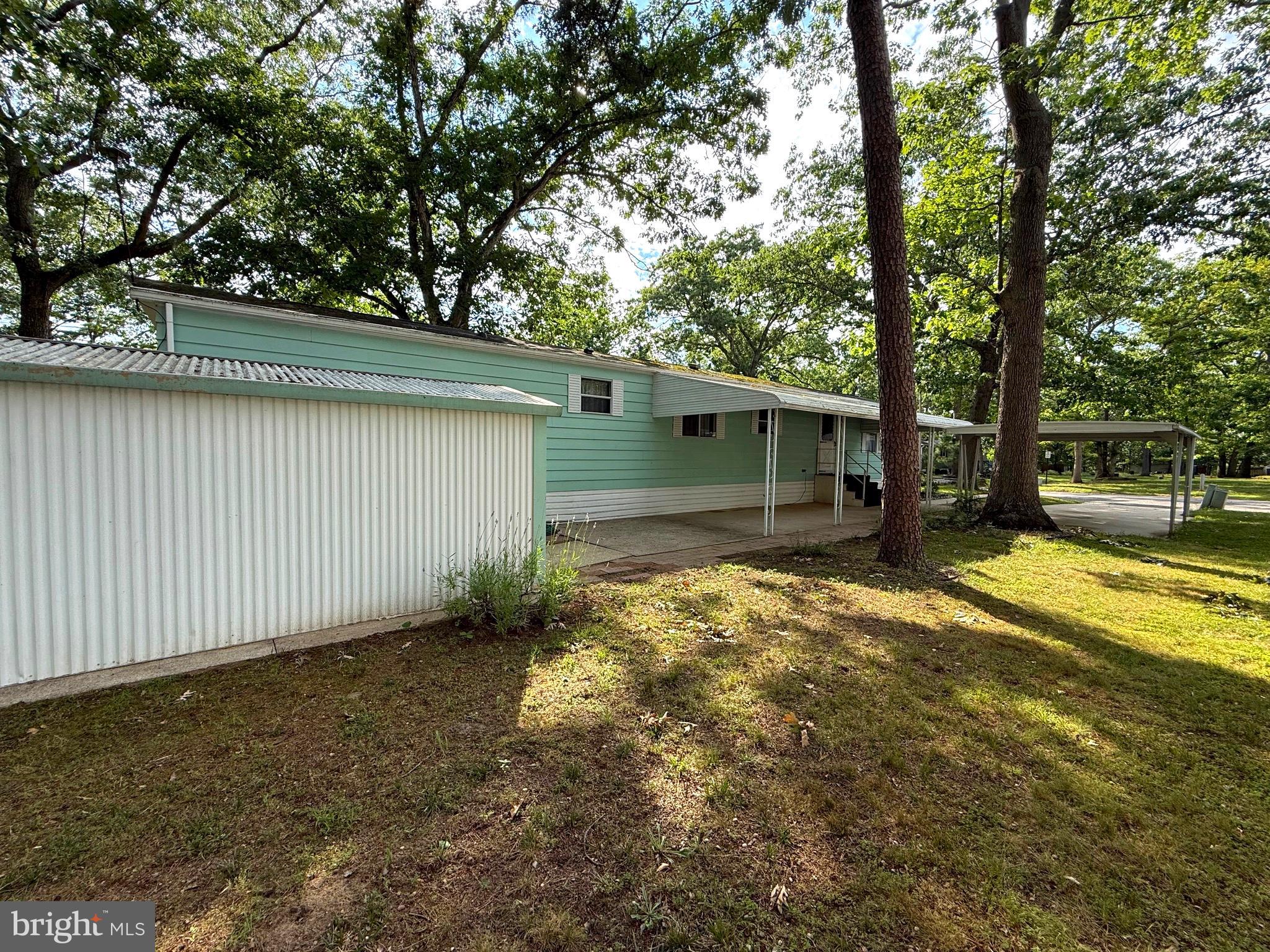 87 Holly Court Tabernacle, NJ 08088 - Photo 19 of 24 a view of backyard with large tree