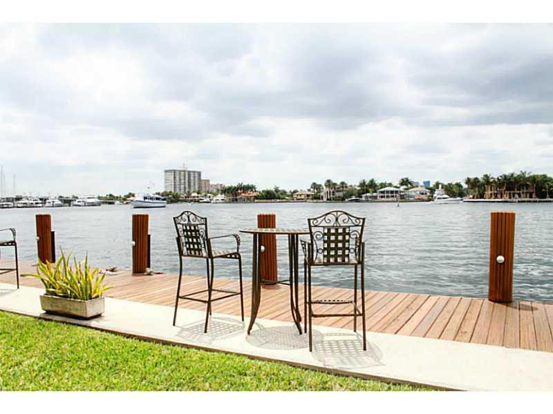 125 North Birch Road, Unit 107 Fort Lauderdale, FL 33304 - Photo 1 of 35 a view of a chairs and table on the terrace