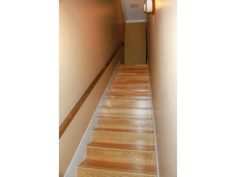 125 North Birch Road, Unit 107 Fort Lauderdale, FL 33304 - Photo 18 of 35 a view of staircase with white walls