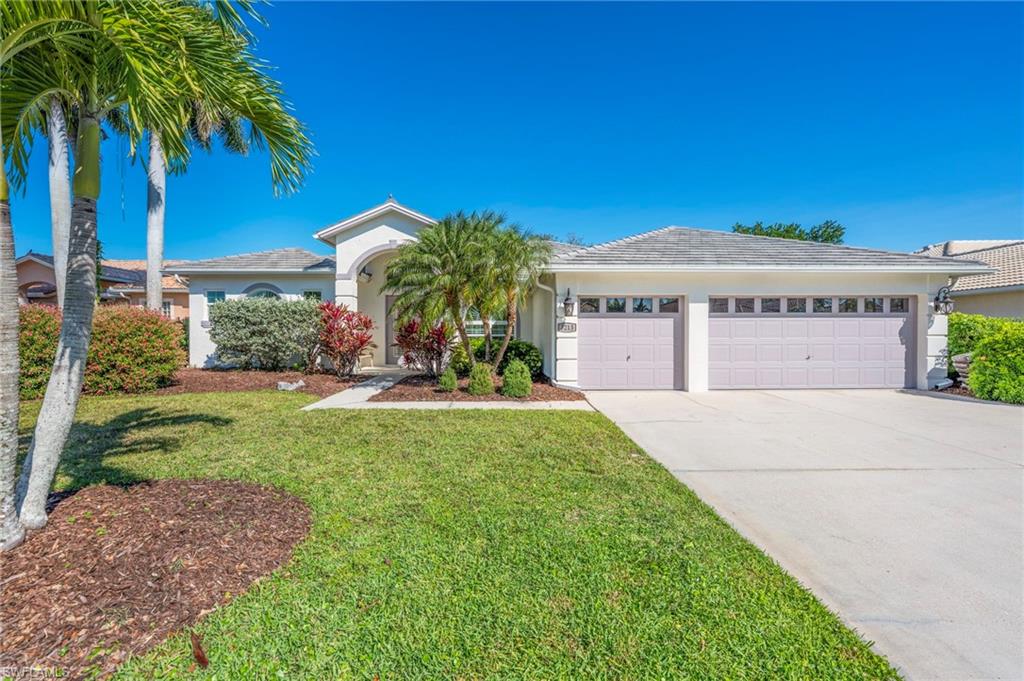3213 Brookeview Court Naples, FL 34120 - Photo 4 of 31 a view of a house with a yard