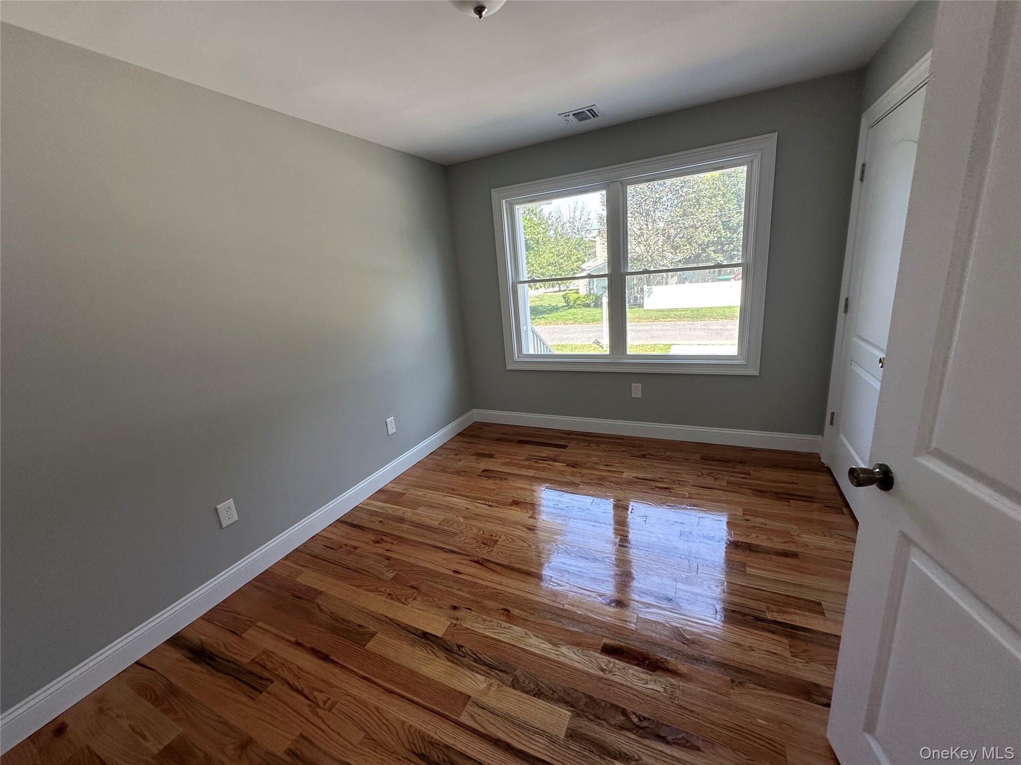 214 Forest Road West Mastic Beach, NY 11951 - Photo 22 of 24 1st Floor Bedroom #3