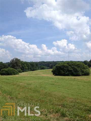 6056 Holly Springs Road Pendergrass, GA 30567 - Photo 1 of 1 a view of an ocean and mountain