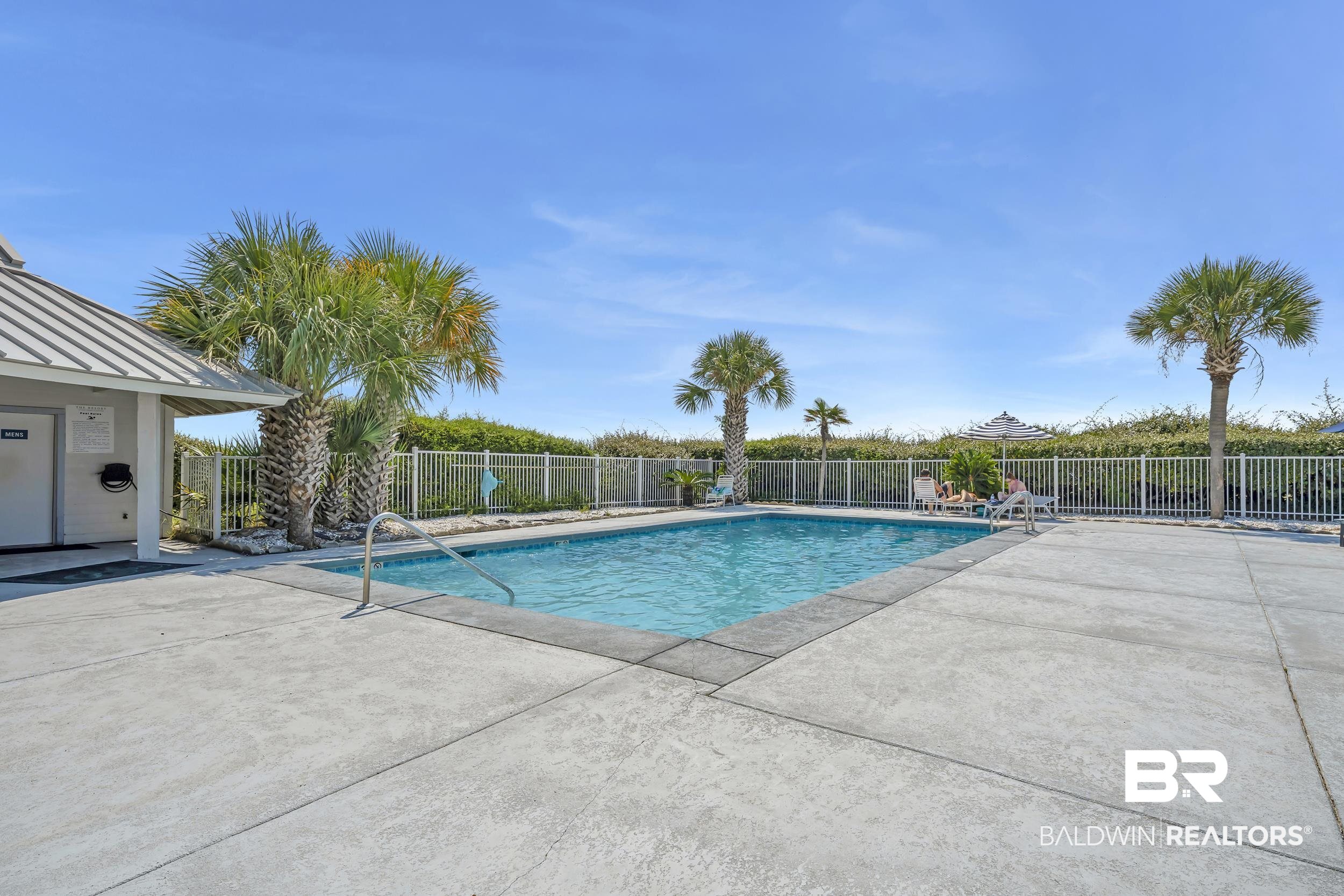 400 Plantation Road, Unit 2118 Gulf Shores, AL 36542 - Photo 29 of 59 Rectangular inground pool with concrete surround