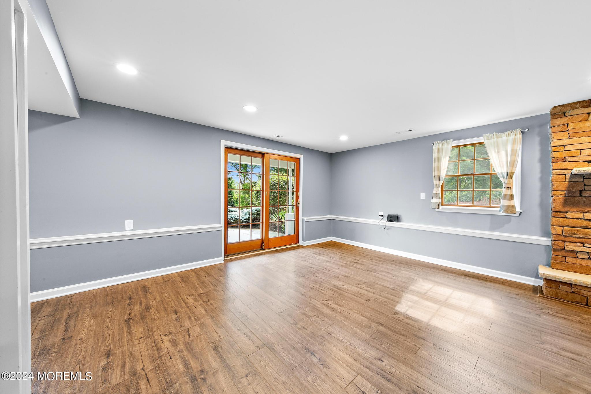 27 Ivy Hill Road Red Bank, NJ 07701 - Photo 12 of 55 an empty room with wooden floor and windows
