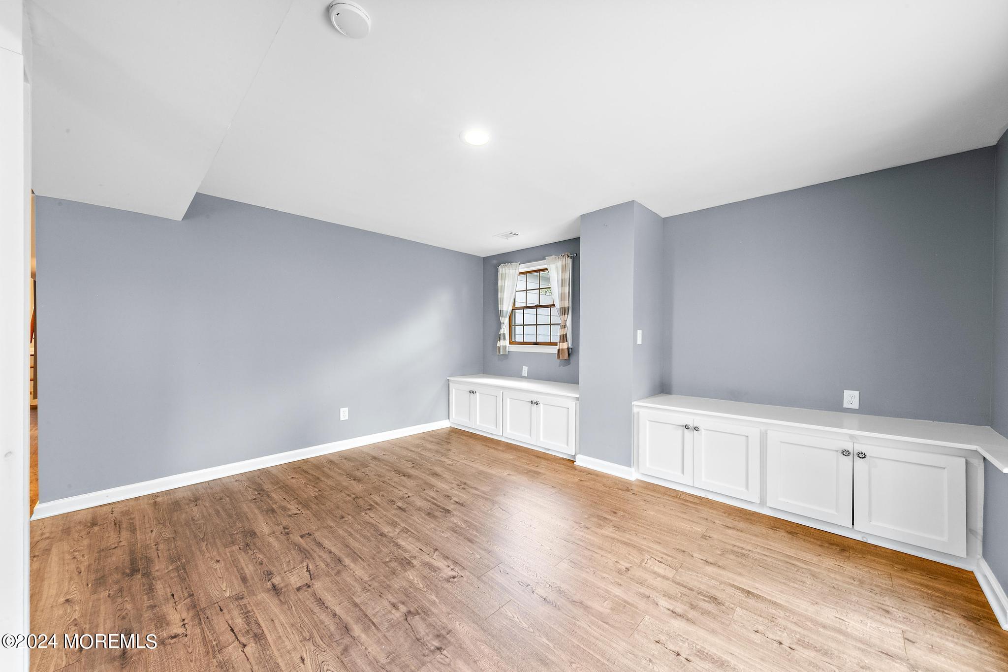 27 Ivy Hill Road Red Bank, NJ 07701 - Photo 13 of 55 a view of empty room with wooden floor