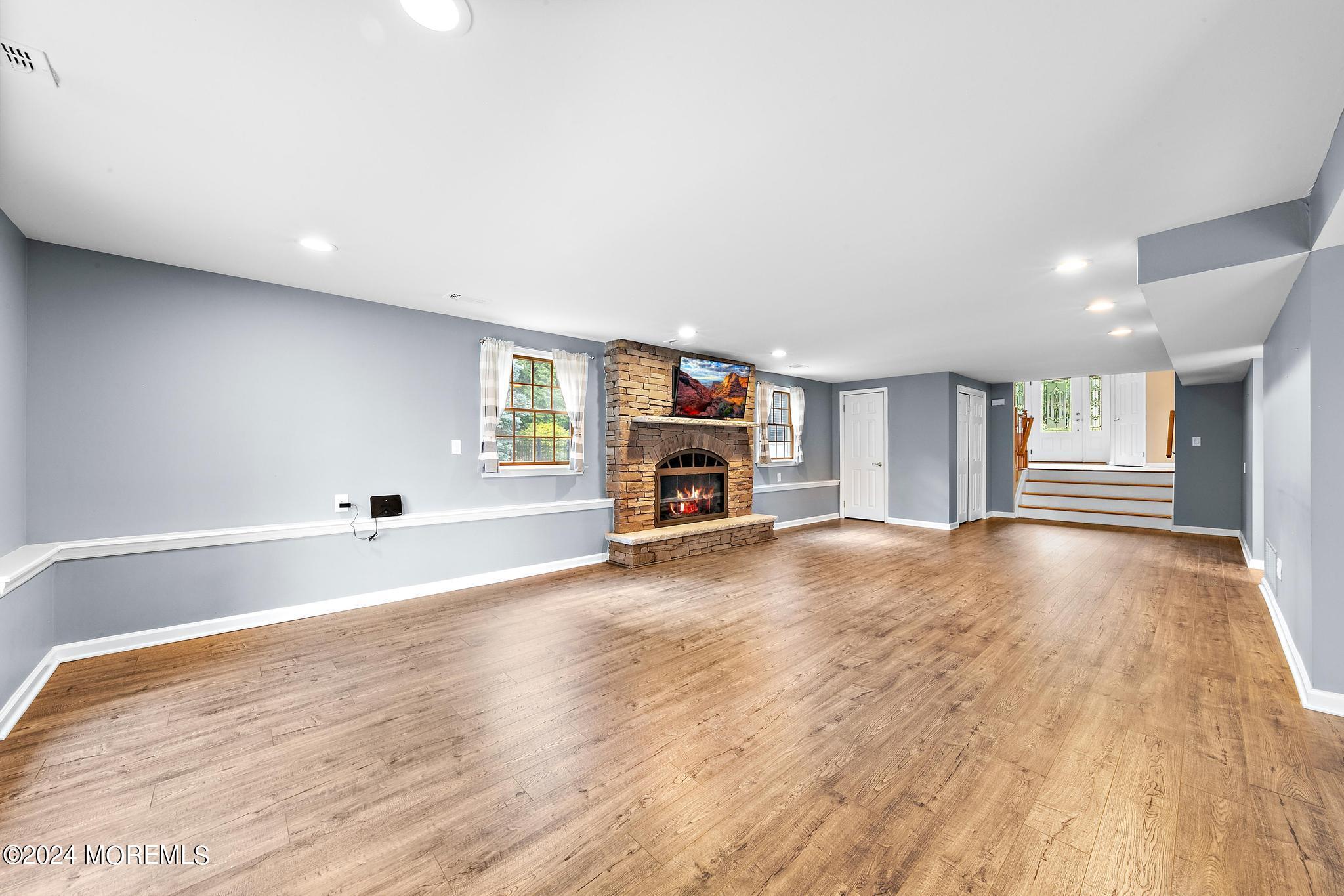 27 Ivy Hill Road Red Bank, NJ 07701 - Photo 14 of 55 a view of empty room with a fireplace