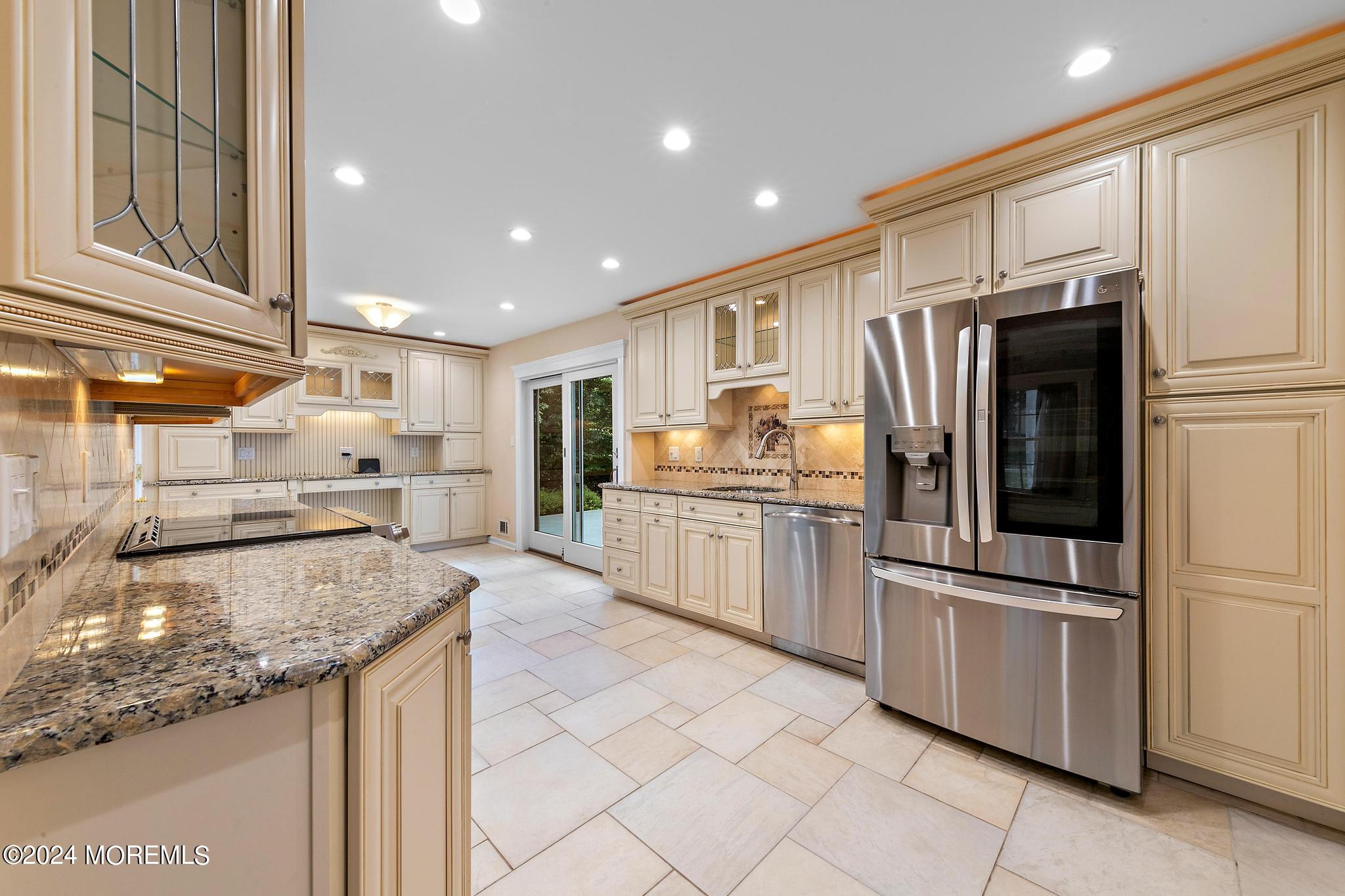 27 Ivy Hill Road Red Bank, NJ 07701 - Photo 20 of 55 a kitchen with stainless steel appliances granite countertop a refrigerator and a sink