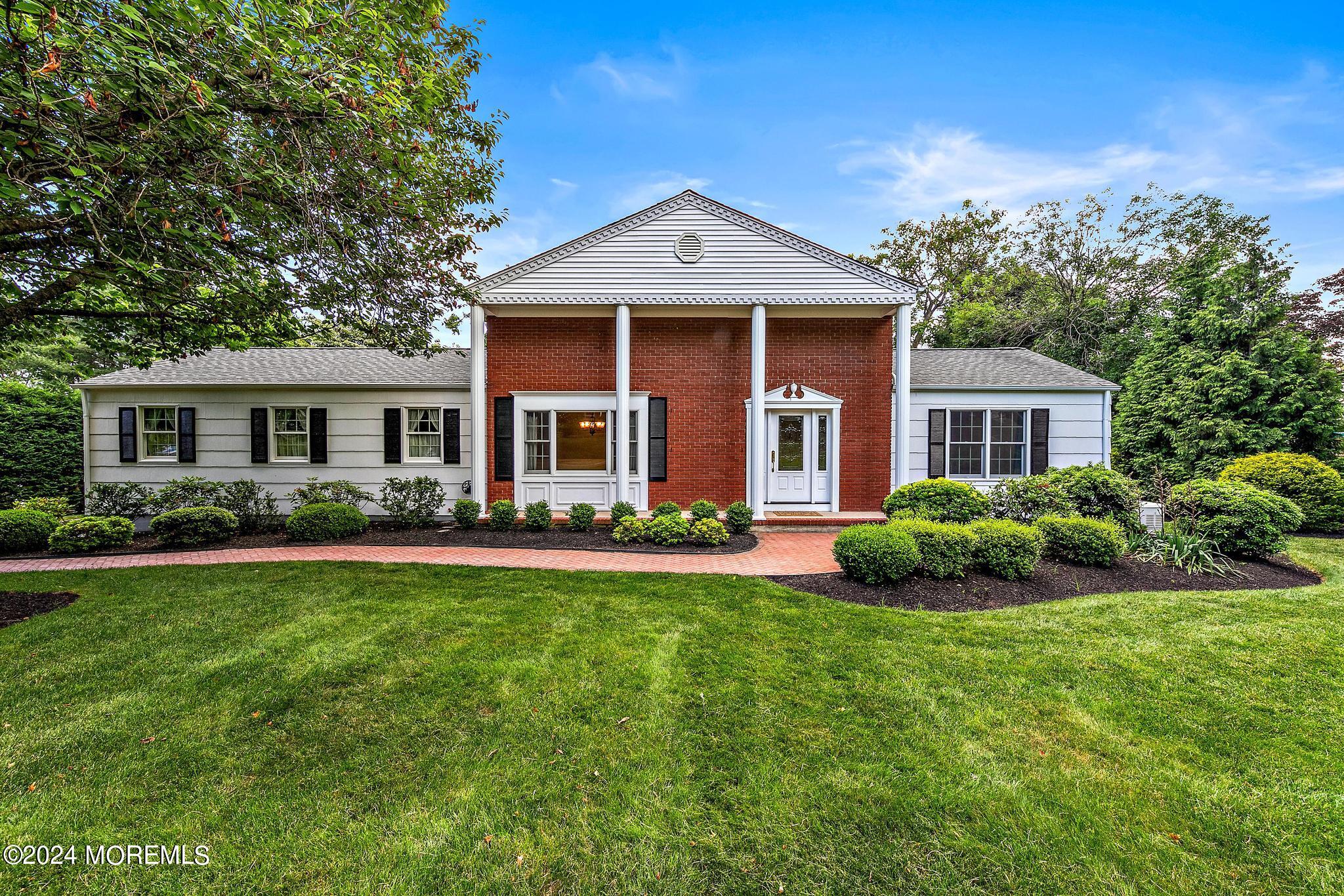 27 Ivy Hill Road Red Bank, NJ 07701 - Photo 2 of 55 a front view of a house with a yard and porch