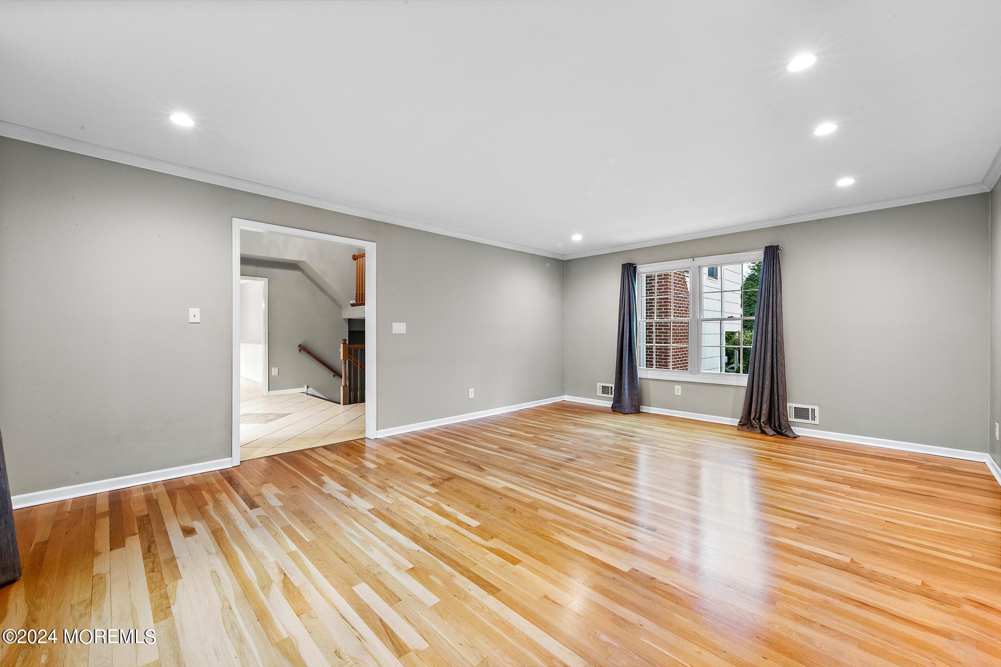 27 Ivy Hill Road Red Bank, NJ 07701 - Photo 27 of 55 a view of empty room with wooden floor