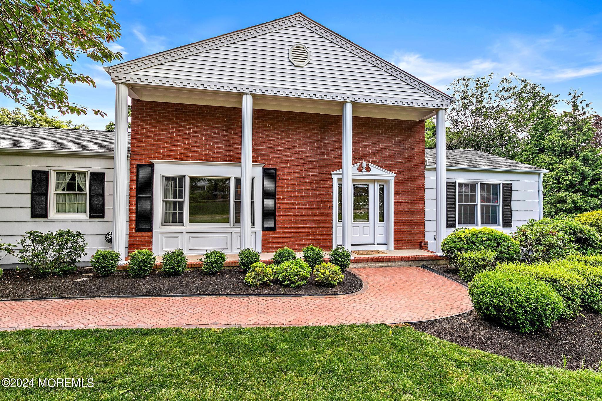 27 Ivy Hill Road Red Bank, NJ 07701 - Photo 3 of 55 a front view of a house with a garden