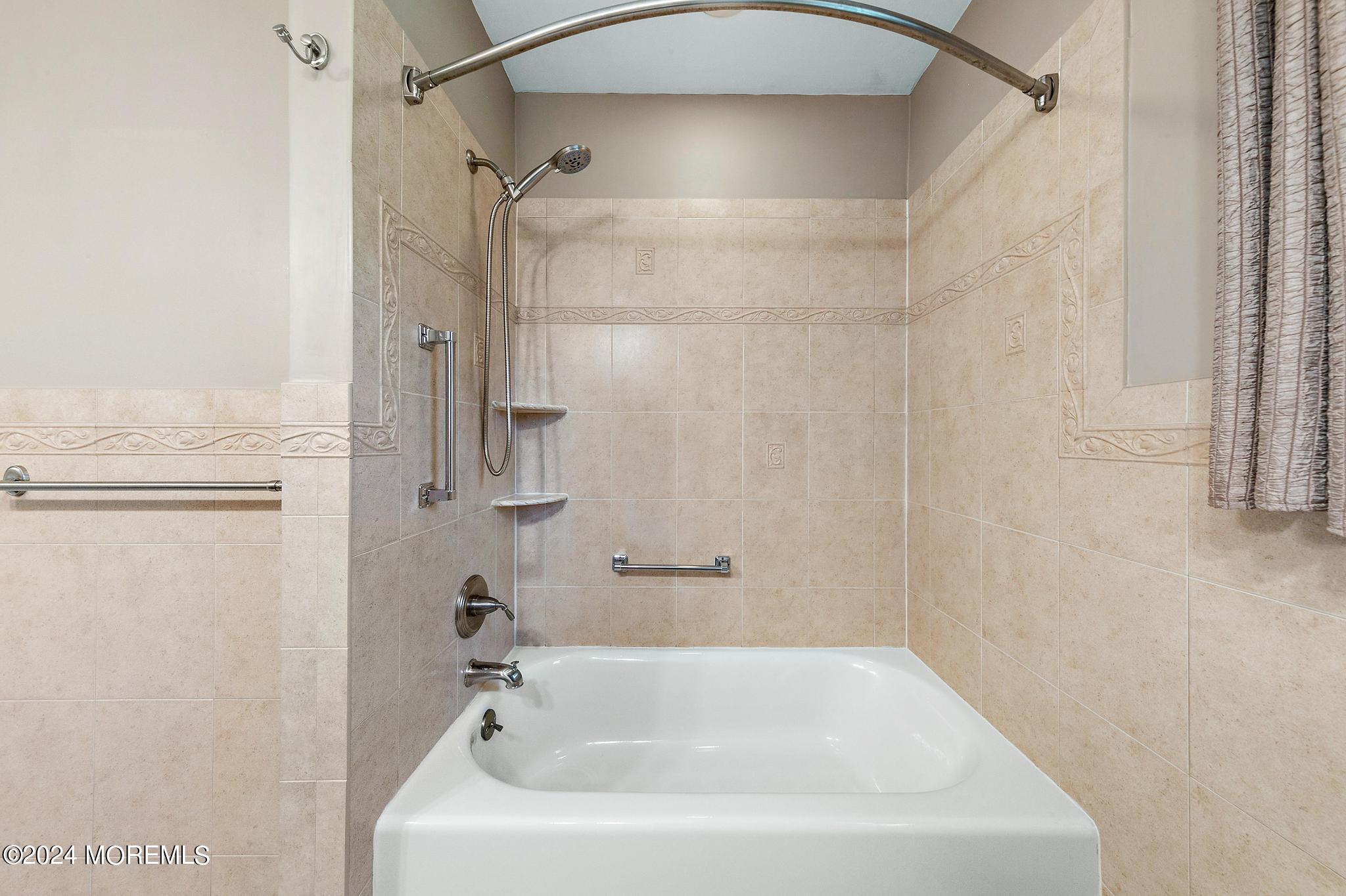 27 Ivy Hill Road Red Bank, NJ 07701 - Photo 41 of 55 a bathroom with a white bath tub