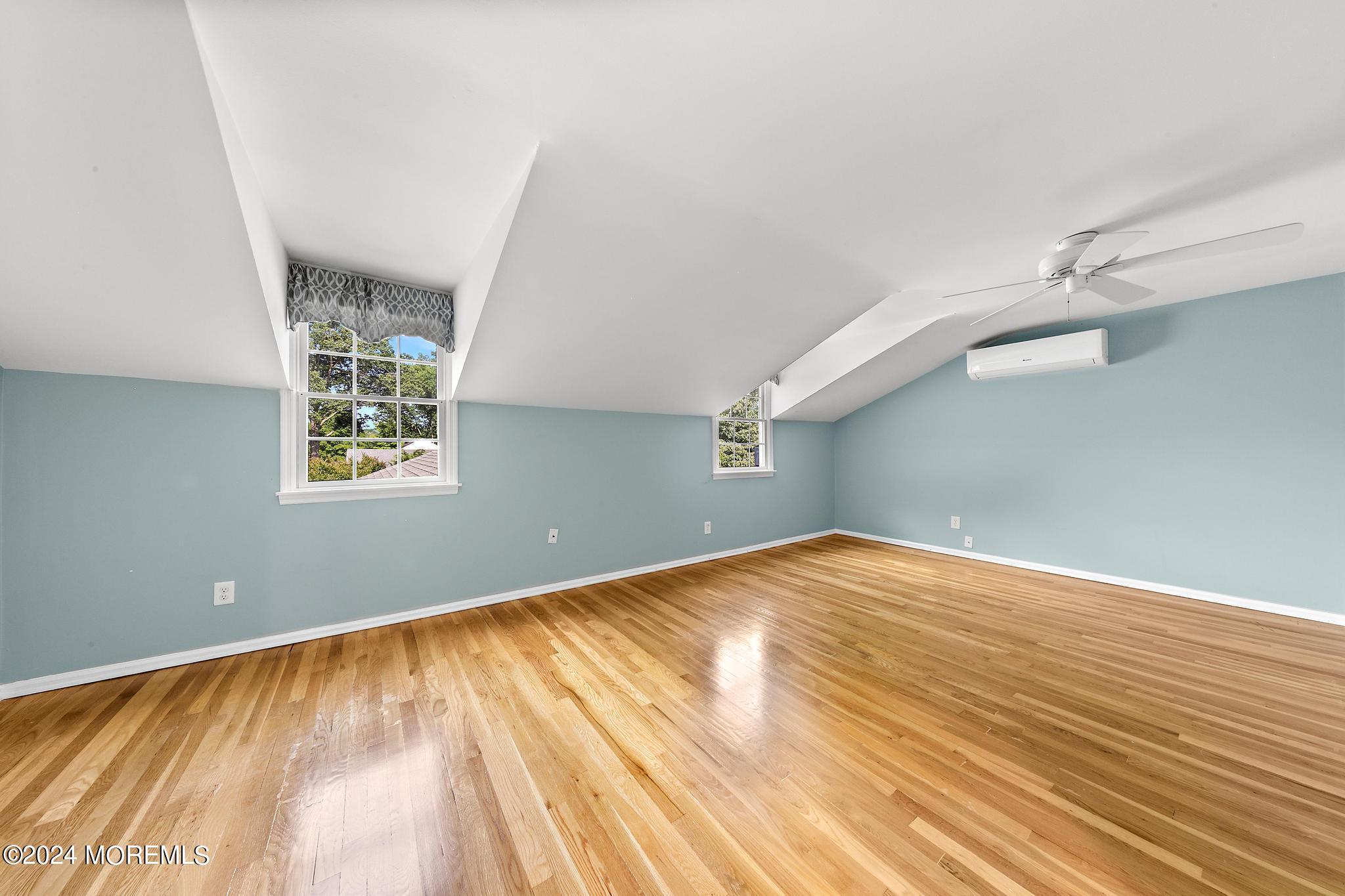 27 Ivy Hill Road Red Bank, NJ 07701 - Photo 42 of 55 wooden floor in an empty room with a window