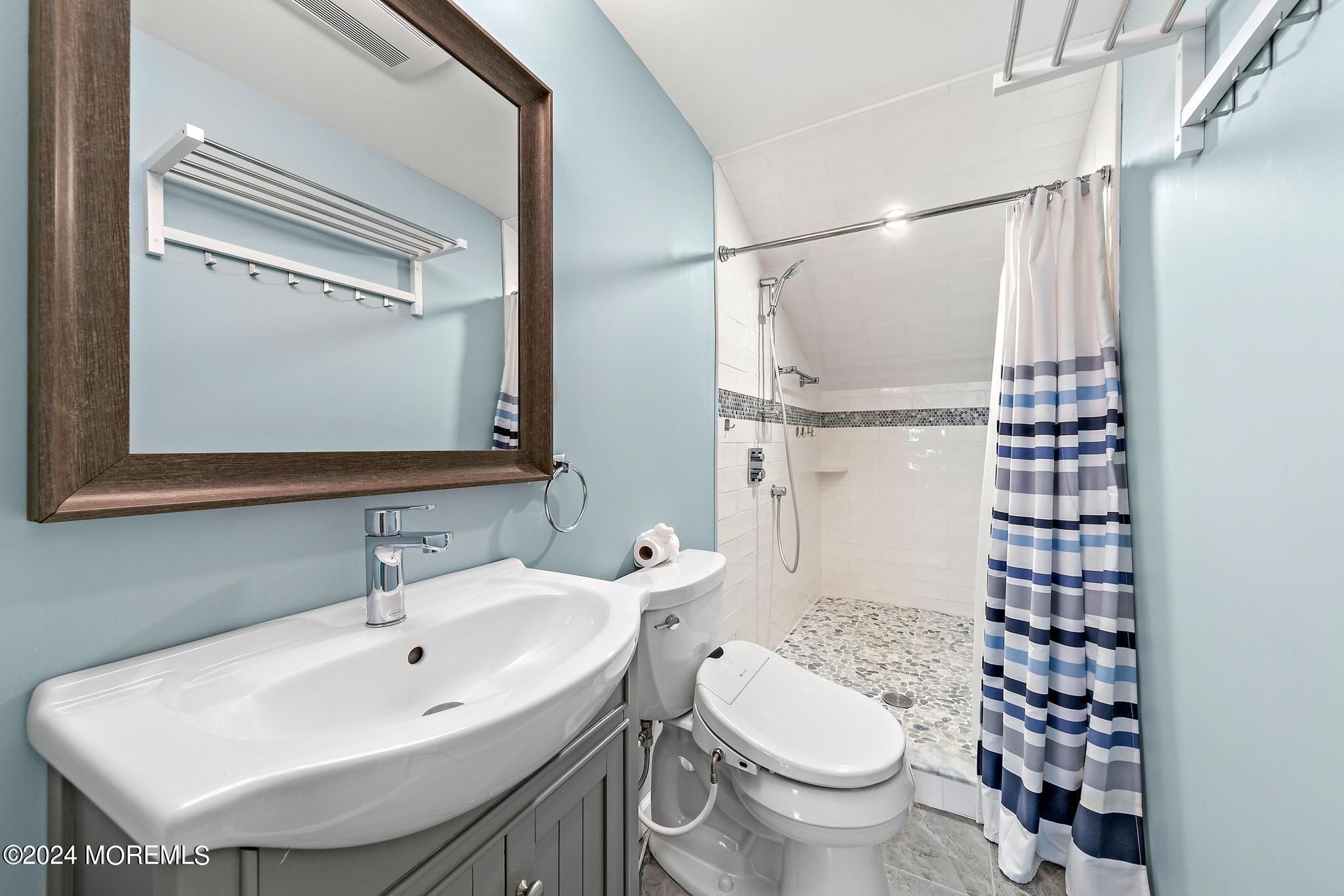 27 Ivy Hill Road Red Bank, NJ 07701 - Photo 44 of 55 a bathroom with a sink toilet and shower