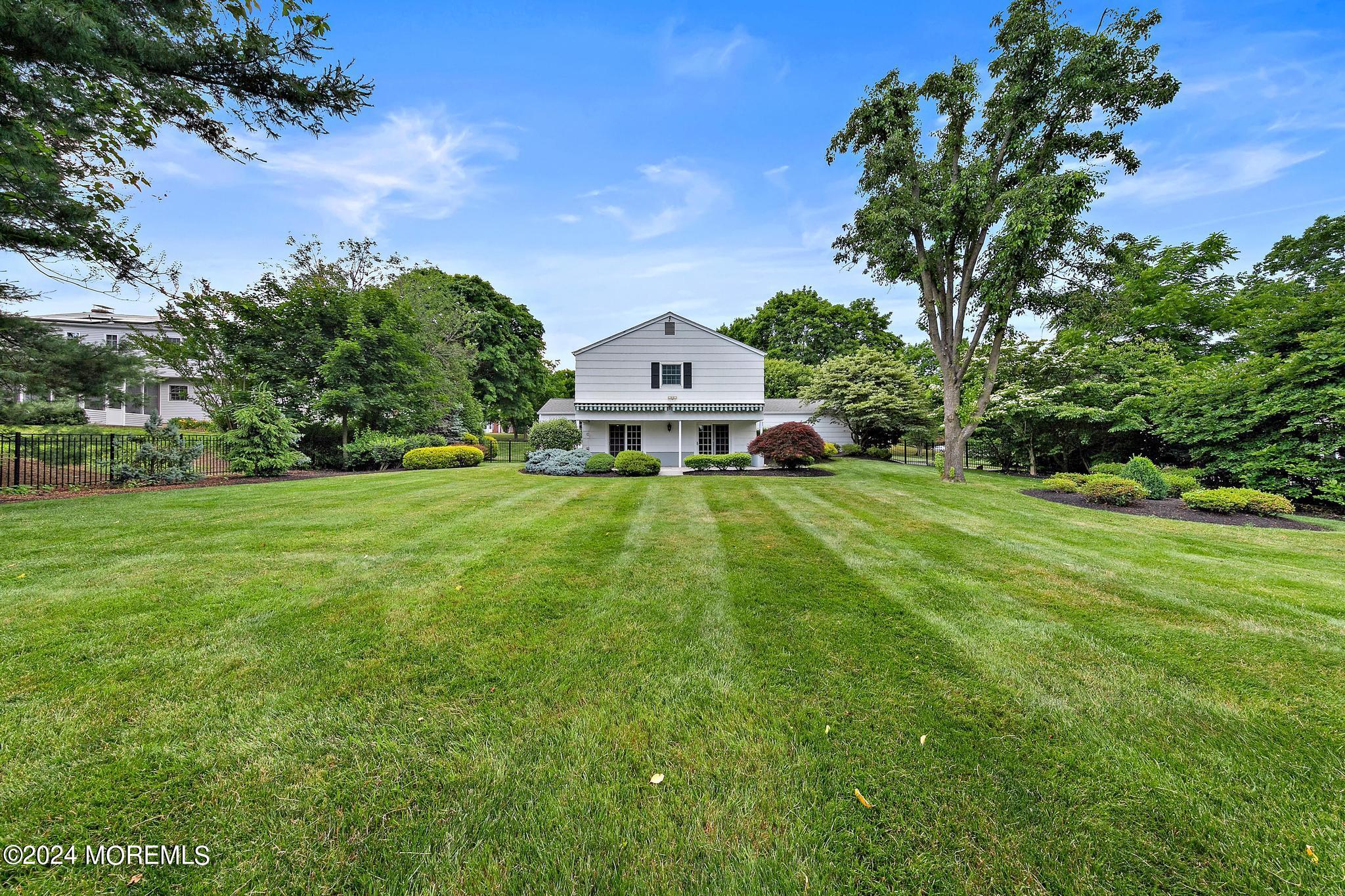 27 Ivy Hill Road Red Bank, NJ 07701 - Photo 50 of 55 a front view of a house with yard and green space