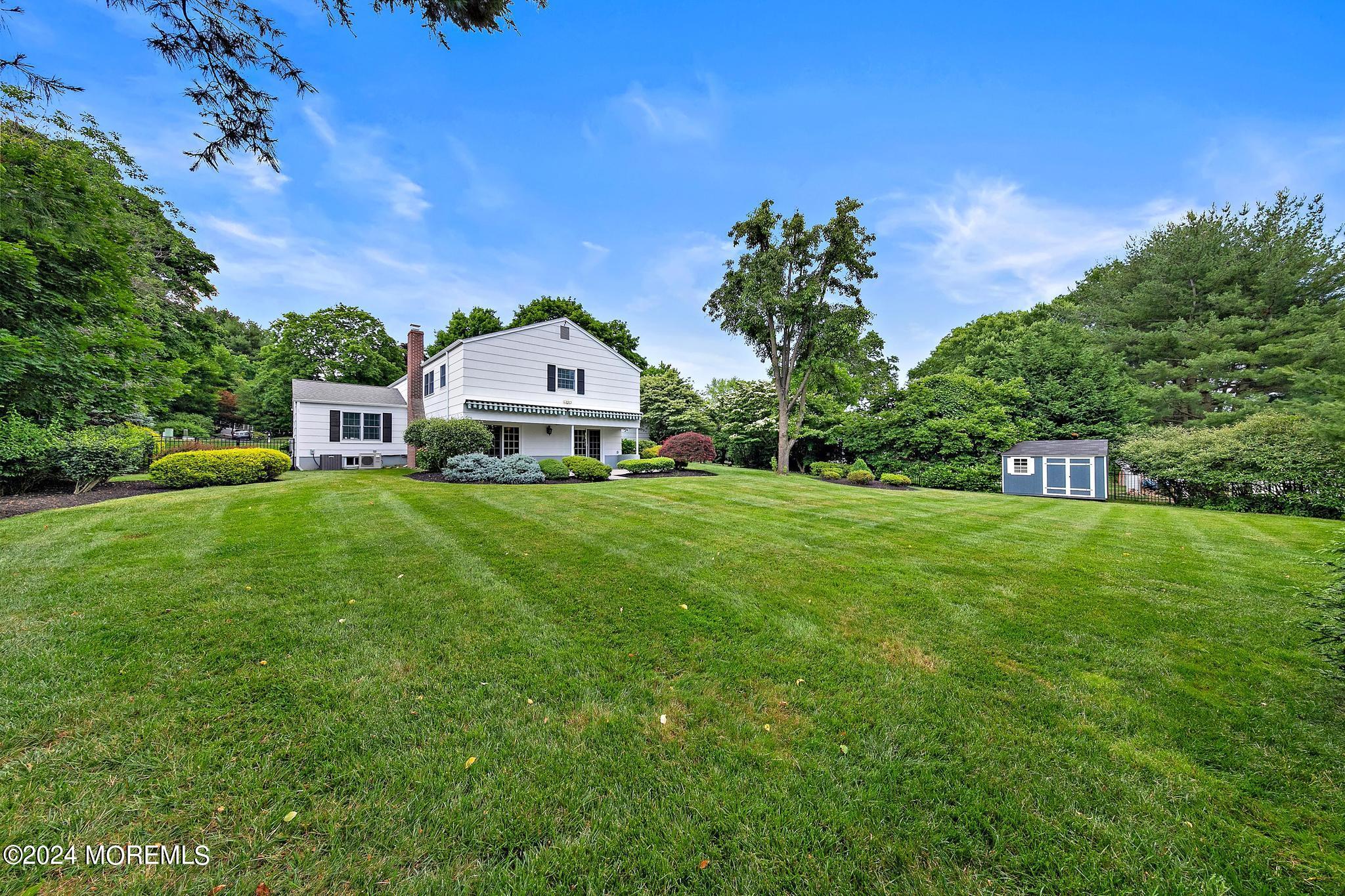 27 Ivy Hill Road Red Bank, NJ 07701 - Photo 51 of 55 a front view of a house with garden