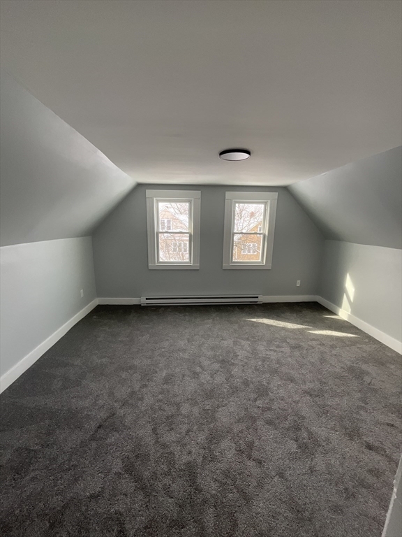 25 Malden Street, Unit 2 Springfield, MA 01108 - Photo 9 of 10 an empty room with a empty space and windows