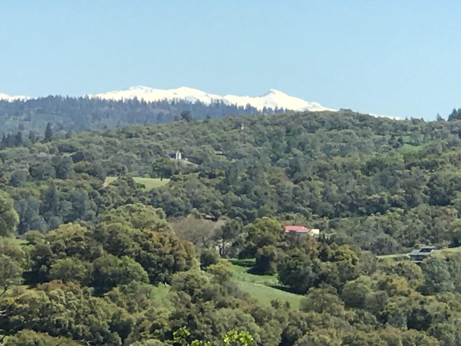 5080 Thompson Hill Road Placerville, CA 95667 - Photo 5 of 37 an aerial view of mountain with trees