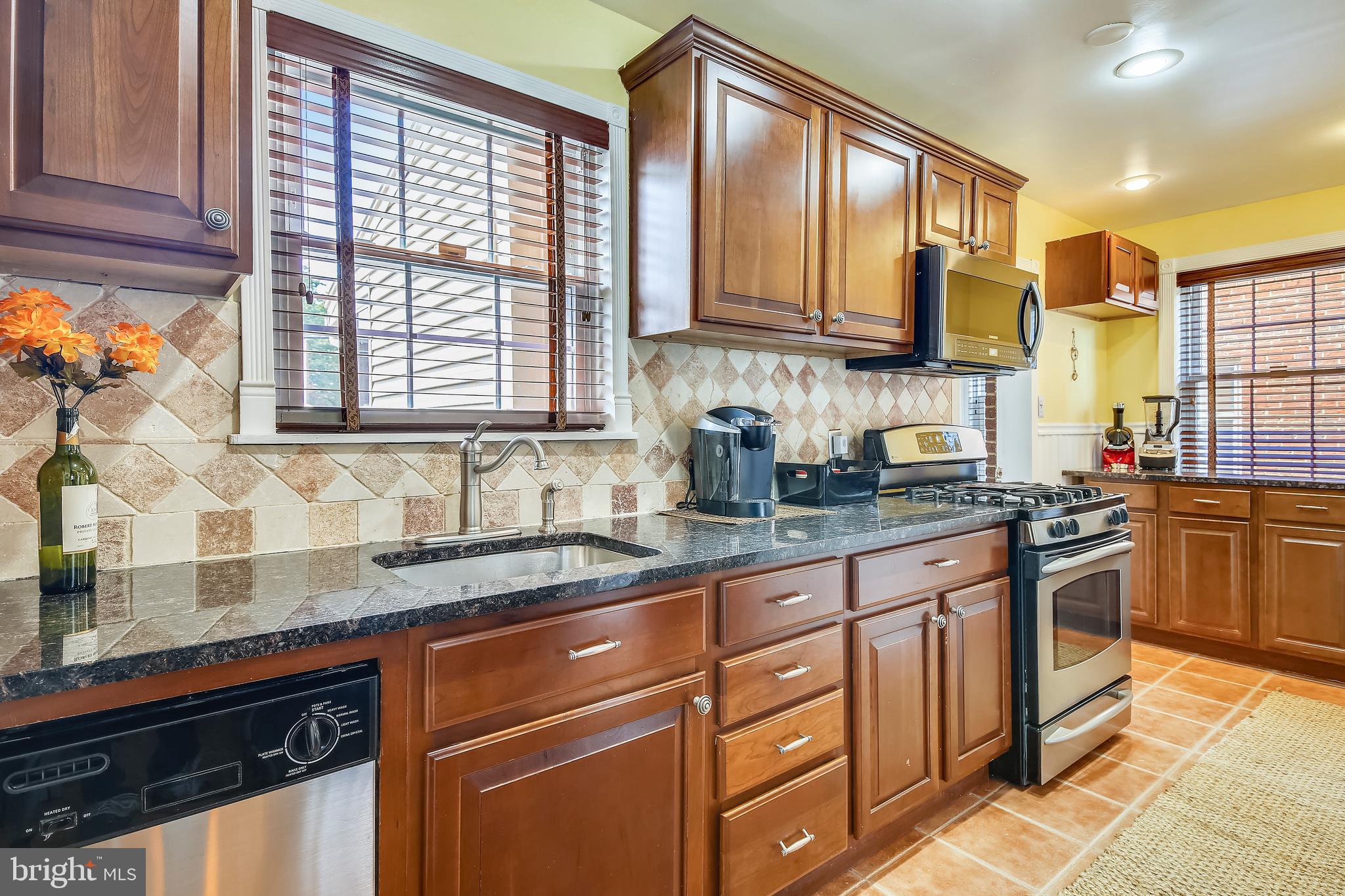 4976 Sargent Road Northeast Washington, DC 20017 - Photo 8 of 29 Renovated kitchen with Smart SS appliances