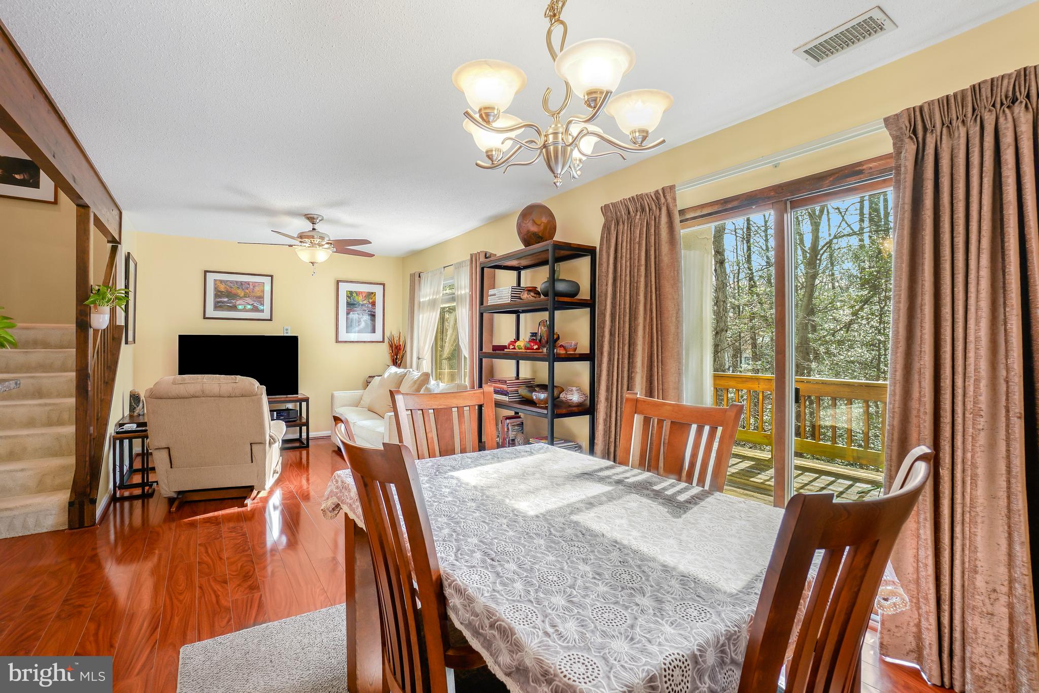 2315 Glade Bank Way Reston, VA 20191 - Photo 12 of 52 a view of a dining room with furniture window and wooden floor