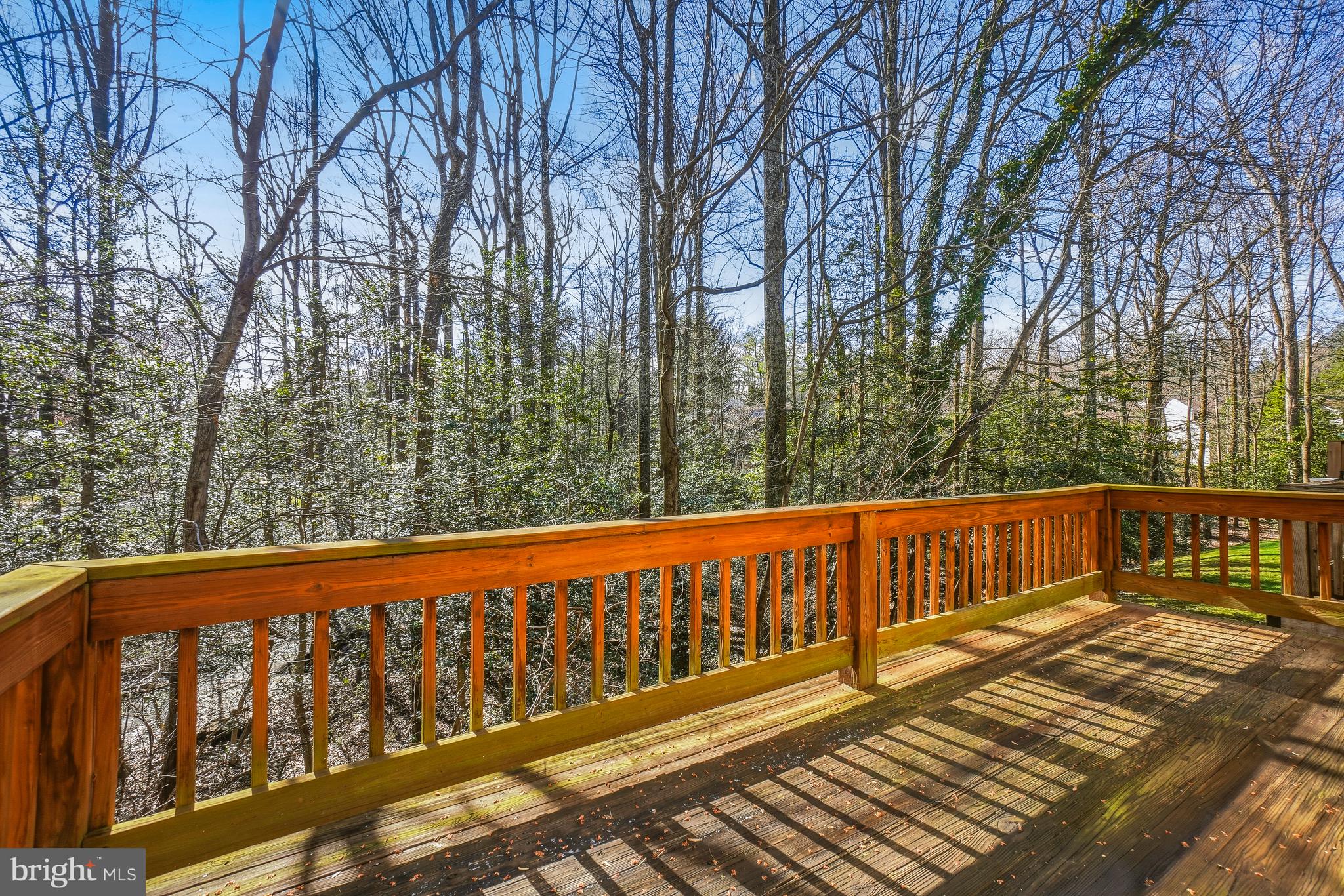 2315 Glade Bank Way Reston, VA 20191 - Photo 14 of 52 a view of a wooden roof deck