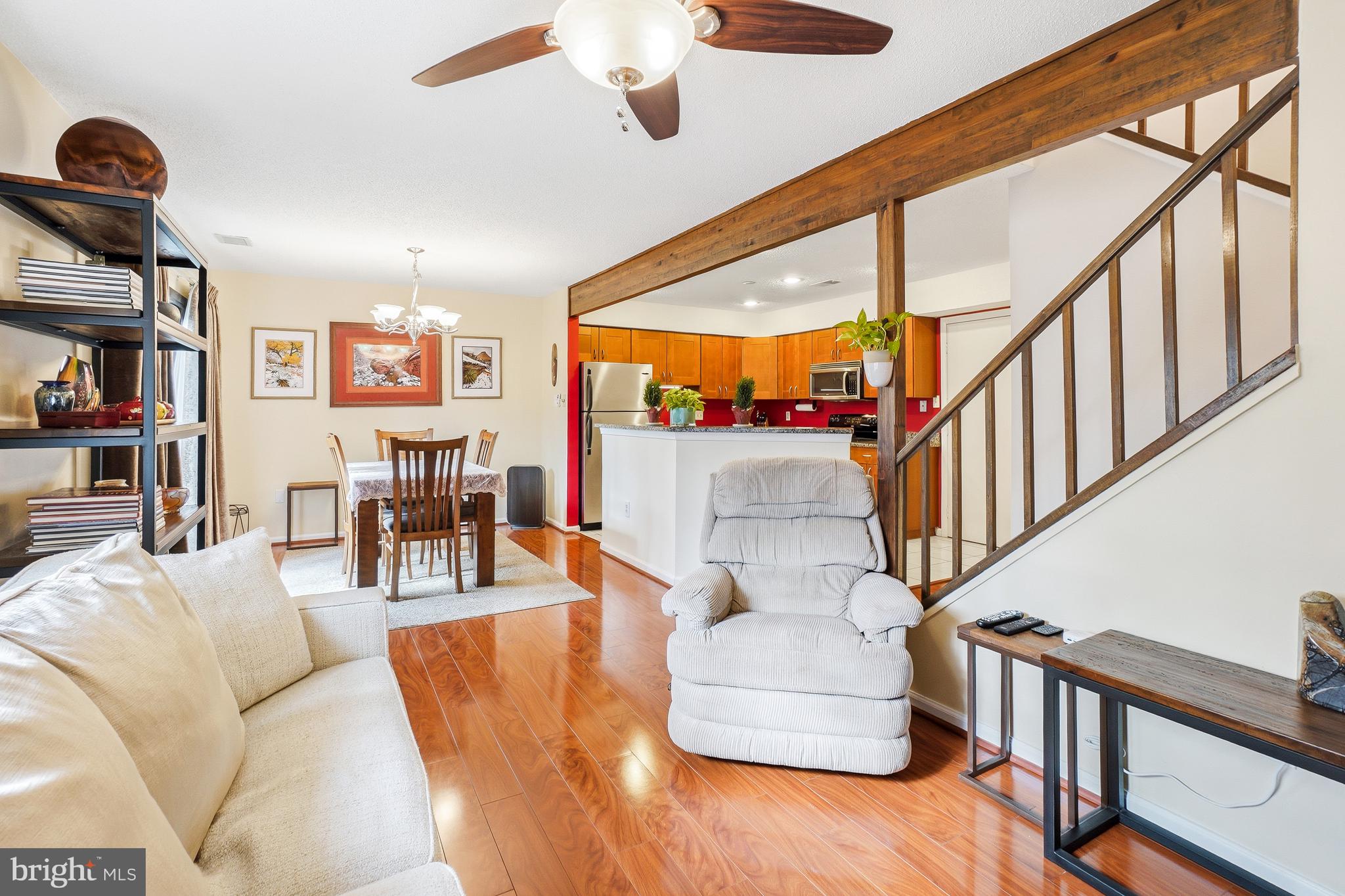 2315 Glade Bank Way Reston, VA 20191 - Photo 16 of 52 a living room with furniture and a large window
